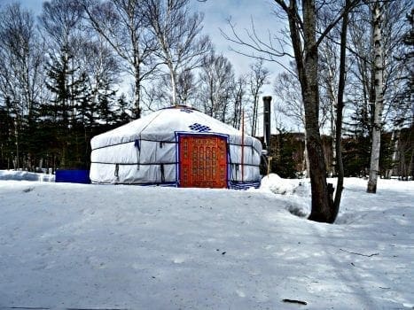 Photo of a Mongolian Yurt in the Wintertime, the Perfect Place for a Valentine’s Day Couples Getaway.